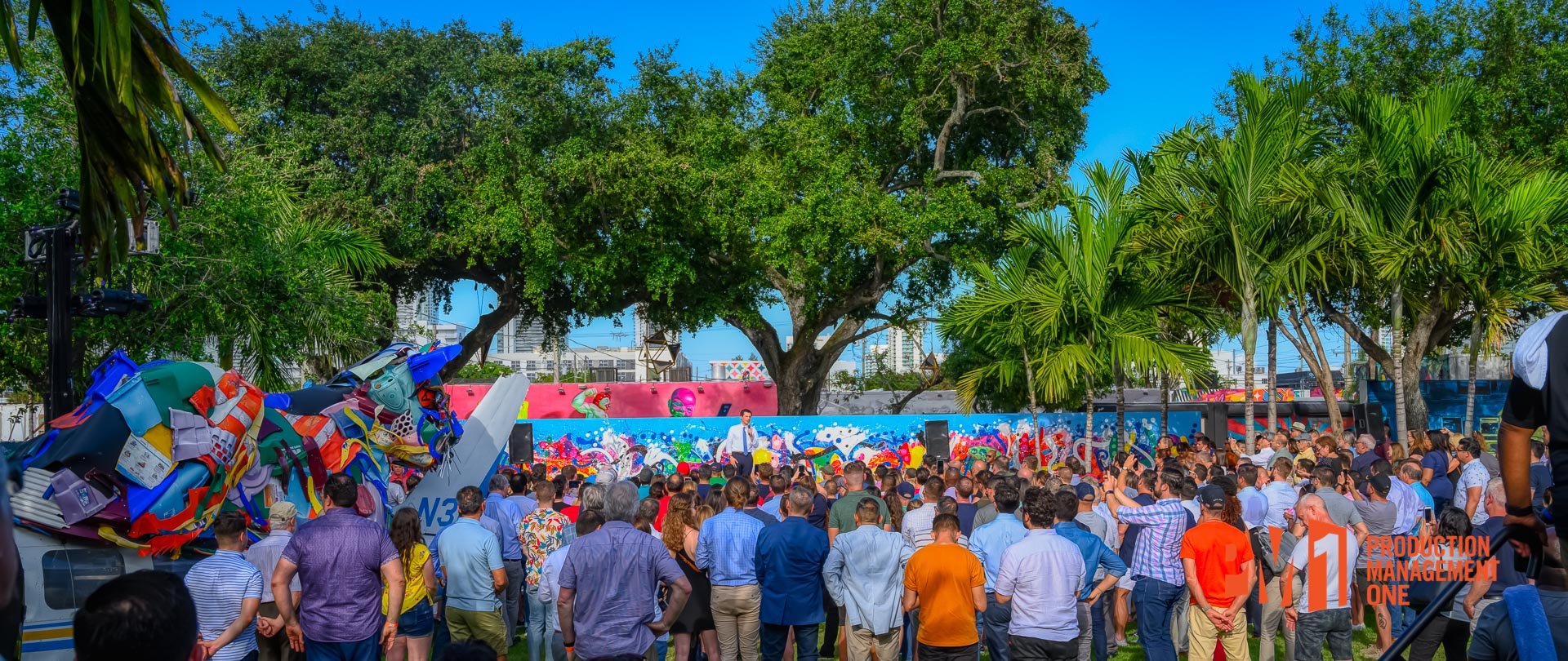A full crowd fills out a main courtyard at Wynwood Walls for a presidential candidate's speech