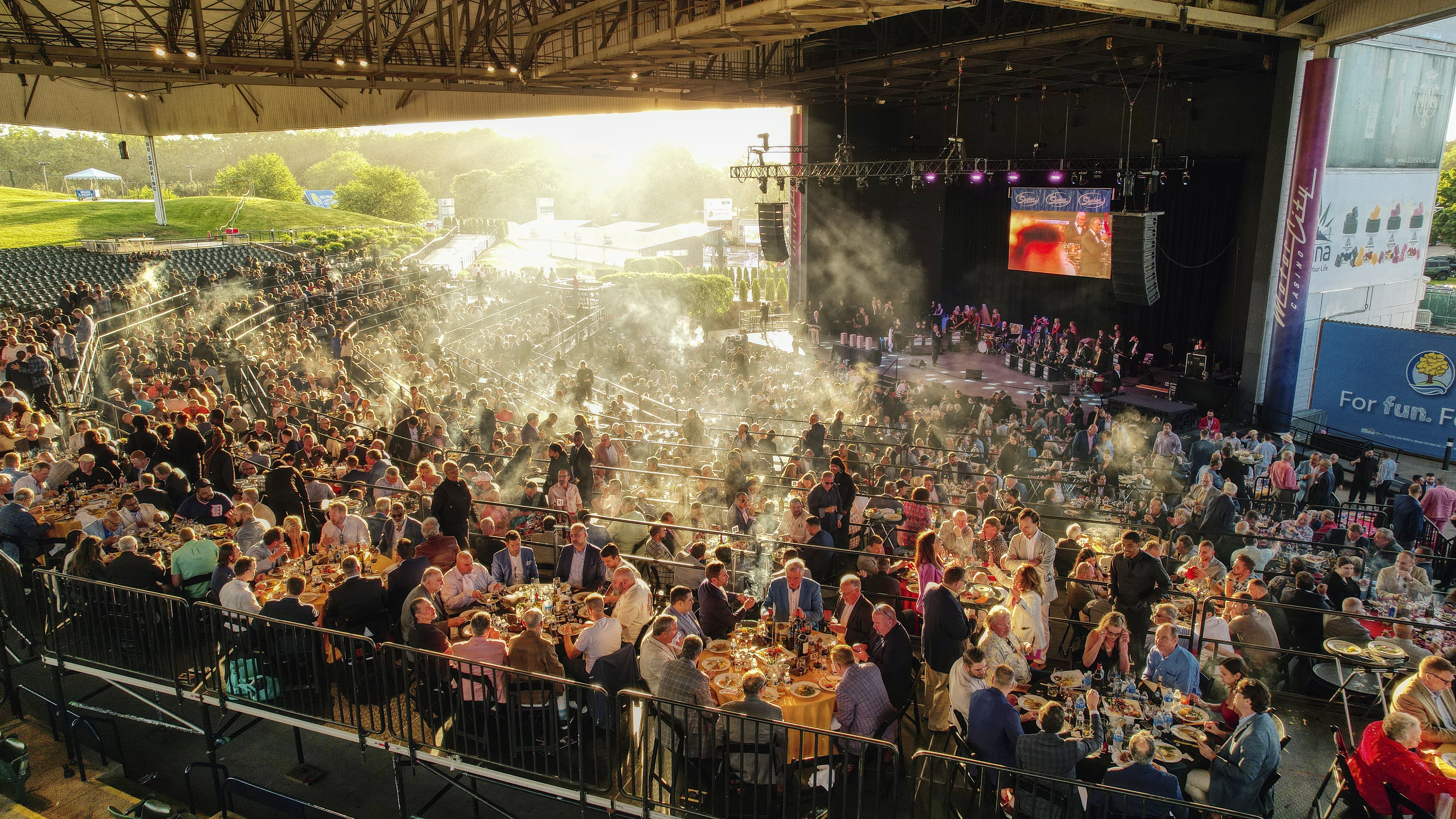 Cars & Cigars fundraiser in metro Detroit on PM1 dinner risers built over amphitheater seating