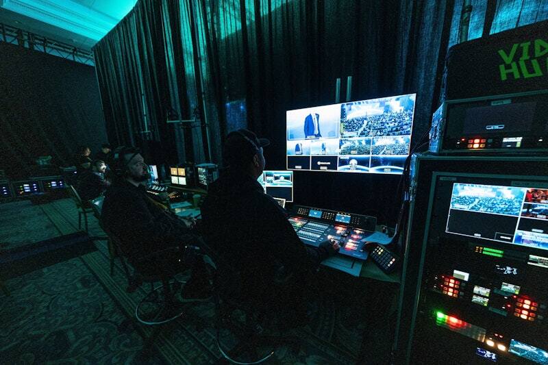 PM1 broadcast control room with operators running video and audio for a live event