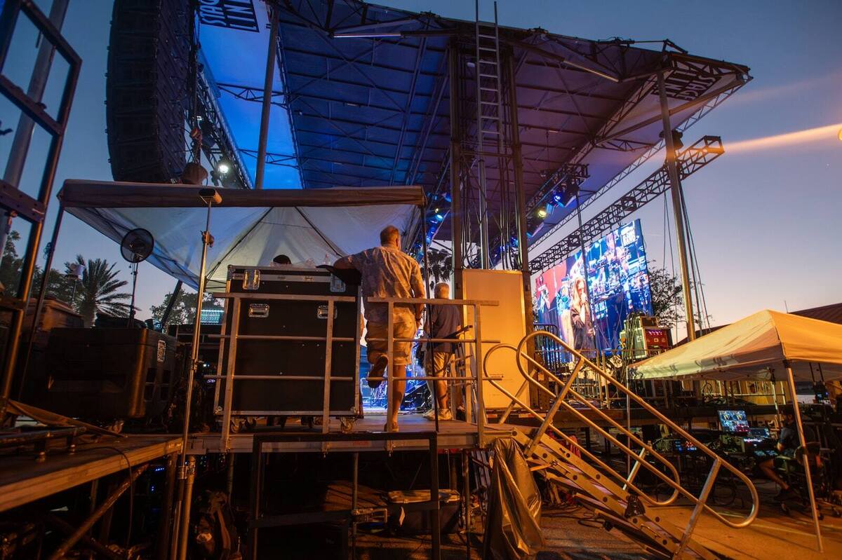 Outdoor concert stage with LED screen, PA, and lighting rig built by PM1
