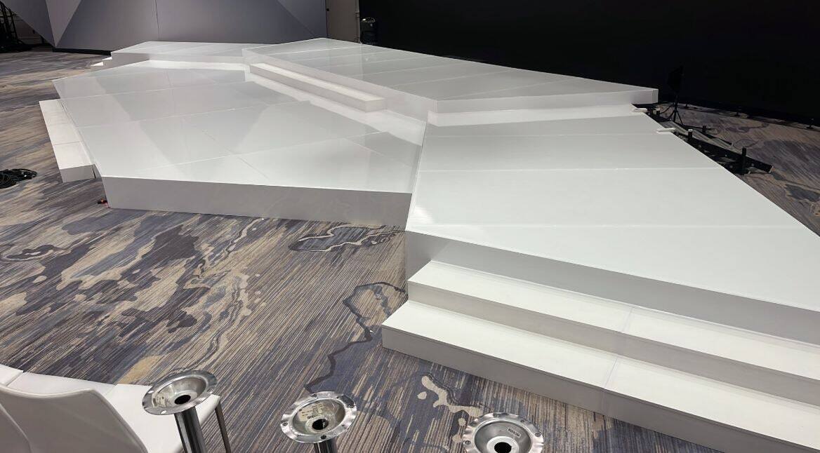 White custom tiered stage platforms built by PM1