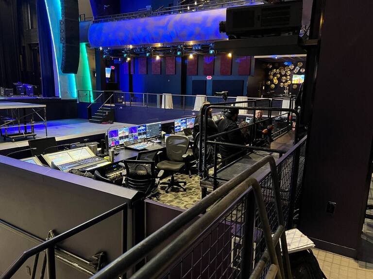 Production control position with monitors and consoles at an election night event in Detroit