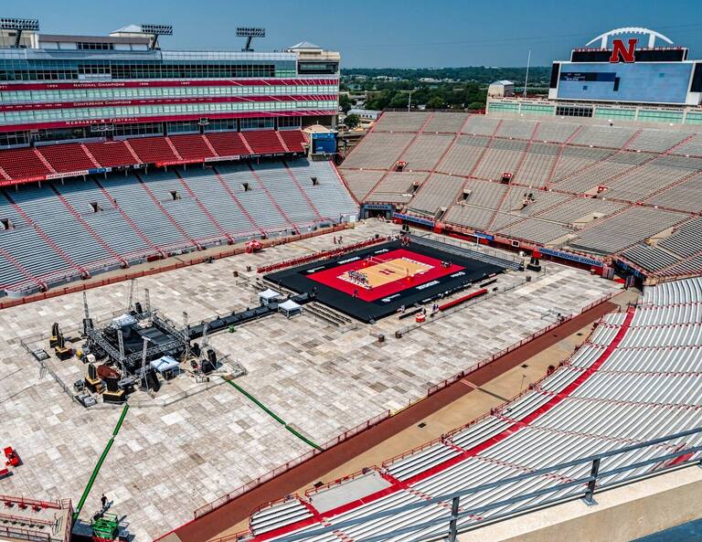 PM1 volleyball court platform set on the field inside Nebraska's Memorial Stadium