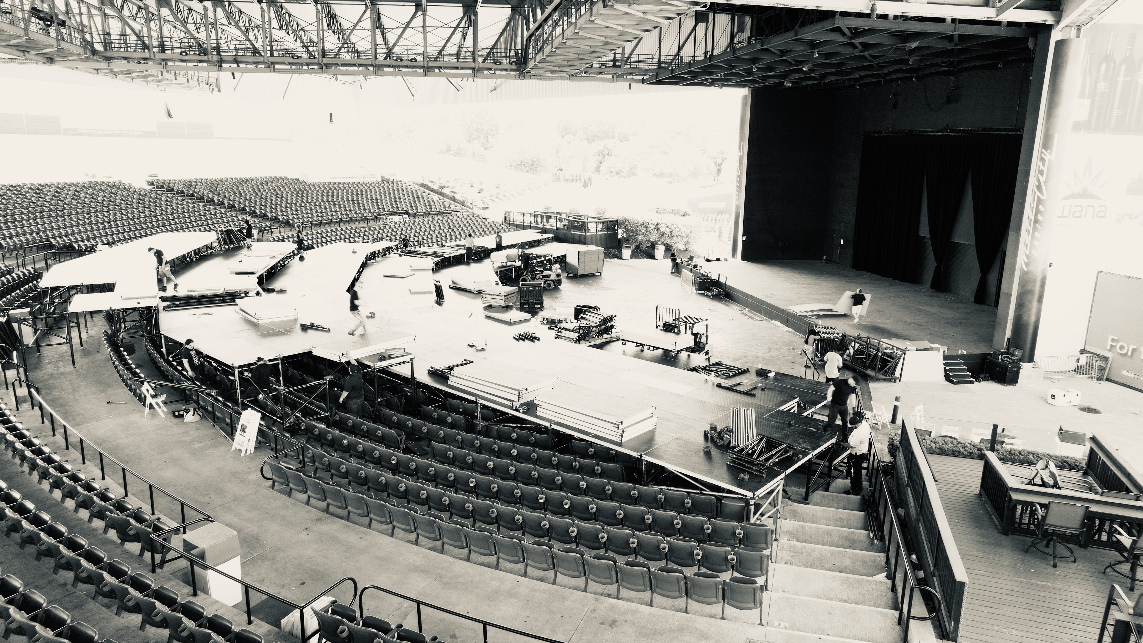 Dinner seating risers over amphitheater seatings during installation