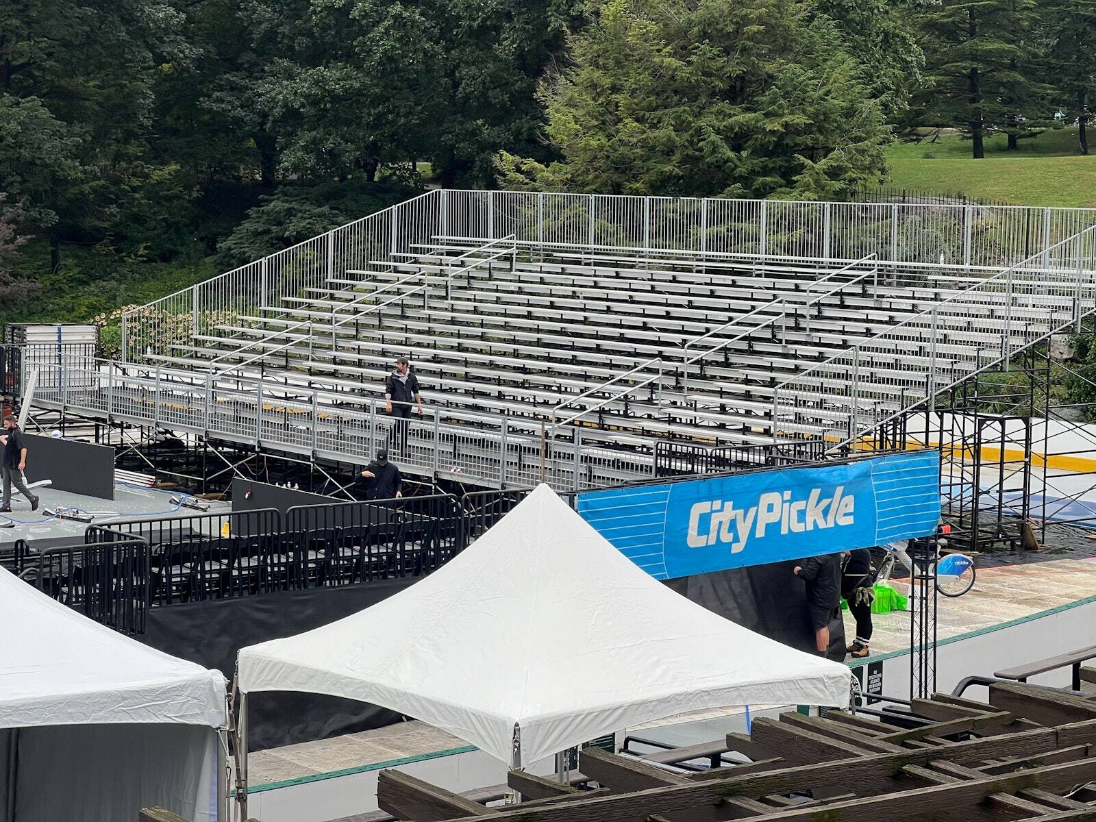 PM1 grandstand ready before doors at a pickleball event in a park